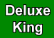 Deluxe King Bed Room: Non-Smoking Room with 1King Bed/Microwave/Refrigerator/Coffeemaker/Alarm Clock Radio/32" Digital TV: Occupancy: 2 people maximum